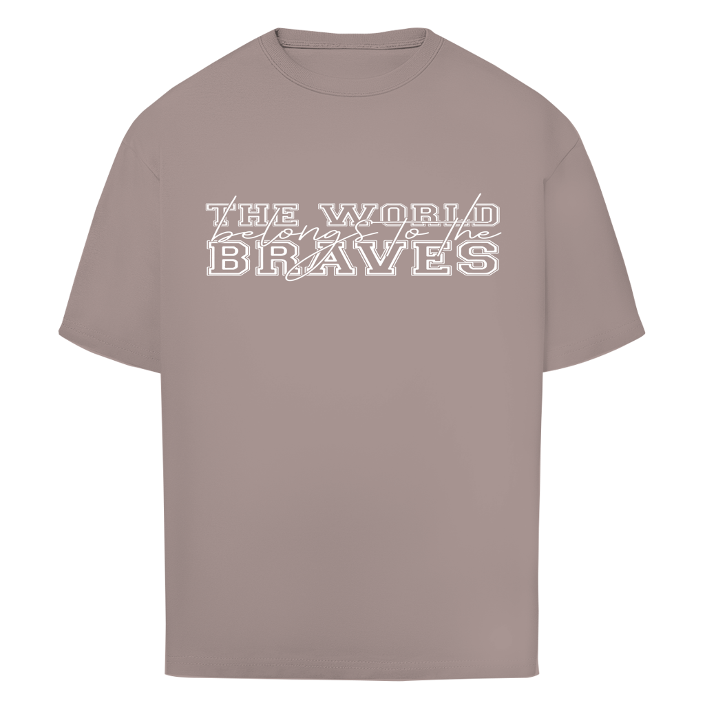 The Oversize Shirt Braves is a taupe tee with "THE WORLD belongs to the BRAVES" in bold white text on the chest—ideal for fans who love an oversized style.